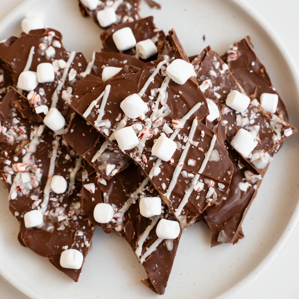 Close-up of decadent Hot Chocolate Bomb Bark, a perfect combination of chocolate, cocoa, and festive toppings.