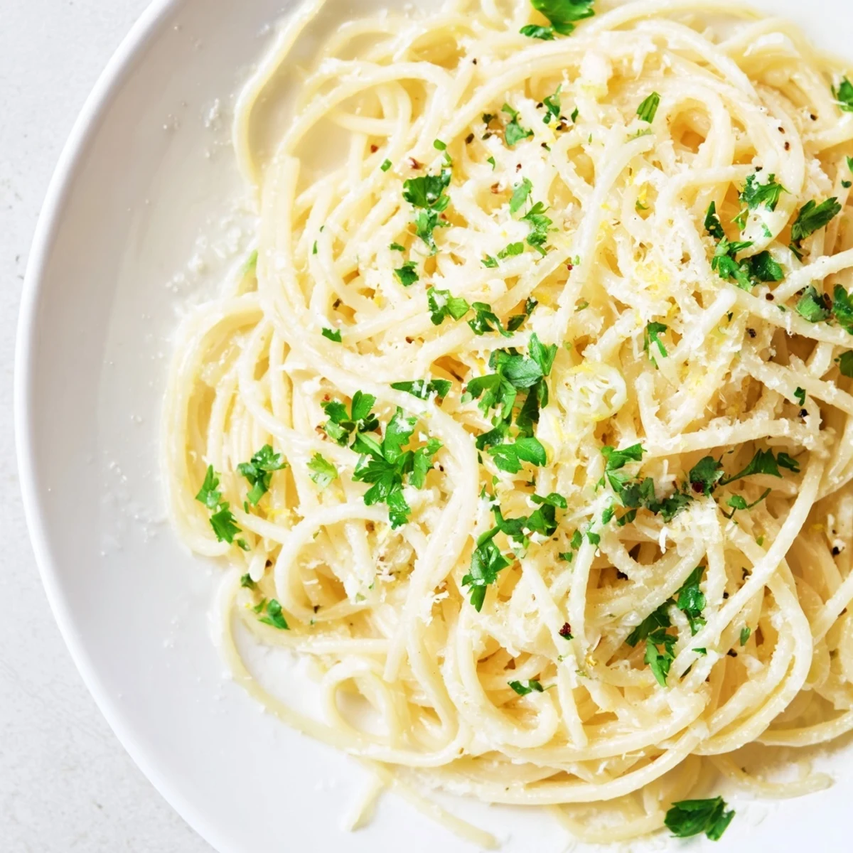Tender spaghetti enveloped in rich garlic butter sauce, a flavorful Garlic Butter Noodles recipe.