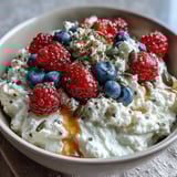 A creamy 5-minute cottage cheese berry bowl topped with crunchy sunflower and pumpkin seeds for a protein-rich snack.