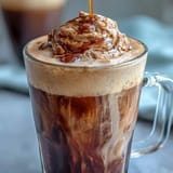 Iced Brown Sugar Hojicha Cold Foam Coffee topped with luxurious, airy foam.
