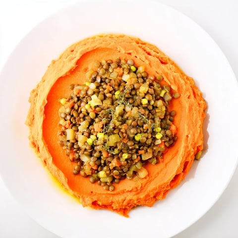 Golden-topped Veggie Shepherd's Pie showing a comforting plant-based meal ready to be served hot.