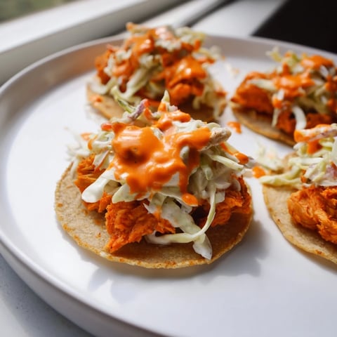 Crispy Buffalo Chicken Smash Burger Tacos with a creamy ranch slaw, ready to satisfy any craving.
