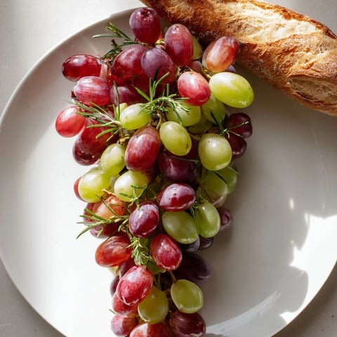 Fresh, glistening Vineyard Grape Cluster, a beautiful appetizer perfect for a party.