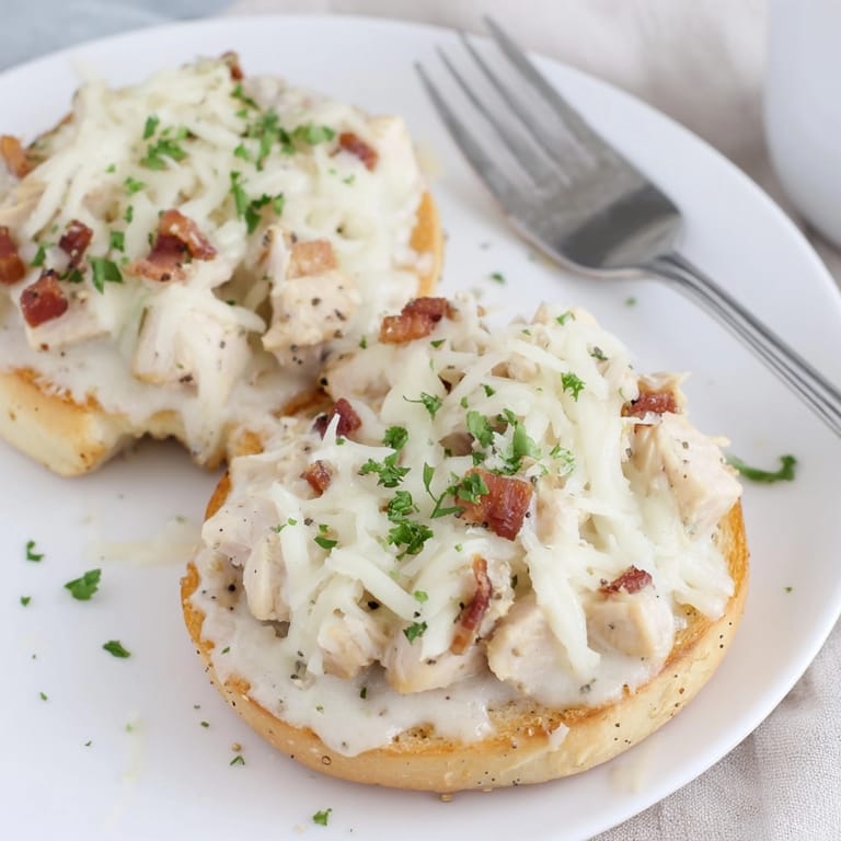 Easy Alfredo Chicken Bacon Pizza Bagels recipe: cheesy, savory, and perfectly baked for sharing.