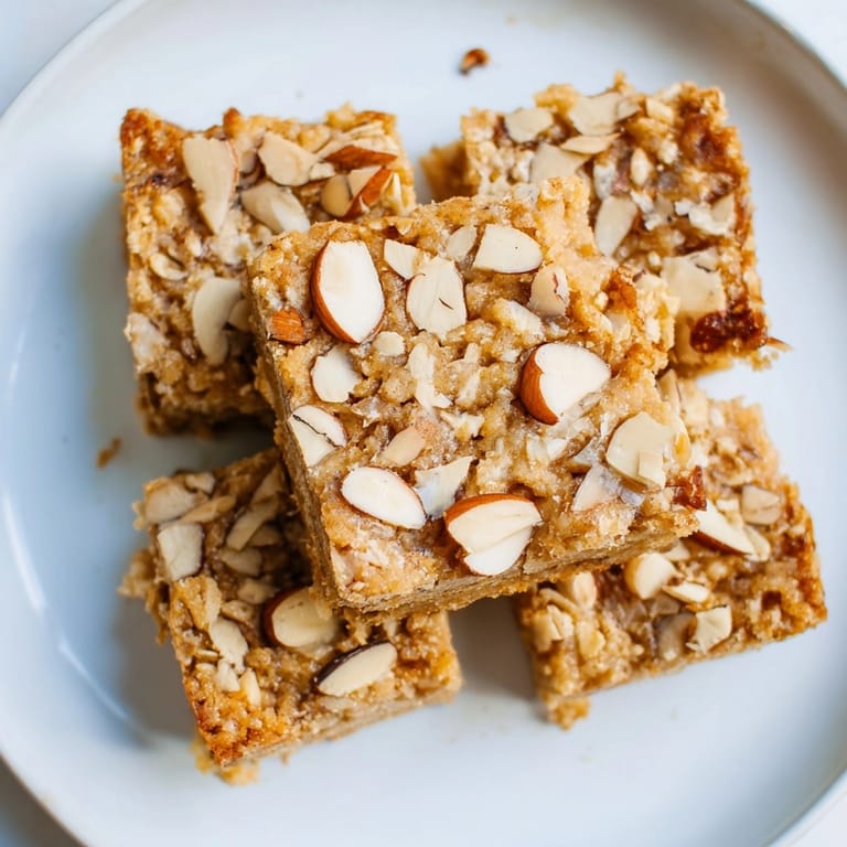 Delicious baked Protein Cinnamon Almond Squares, cut into squares, perfect with coffee for breakfast.