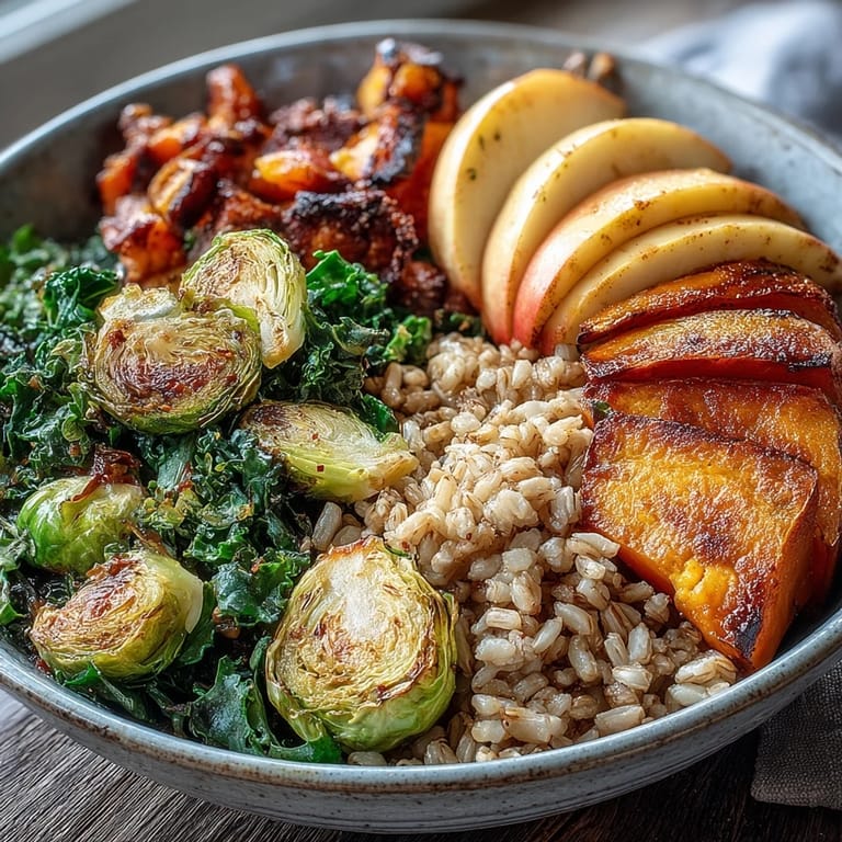 Colorful Fall Vegetable Bowl topped with dried cranberries and vegan cheese, served for a cozy dinner.
