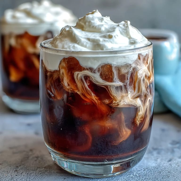 Creamy vanilla sweet cream layered over chilled, strong cold brew coffee.